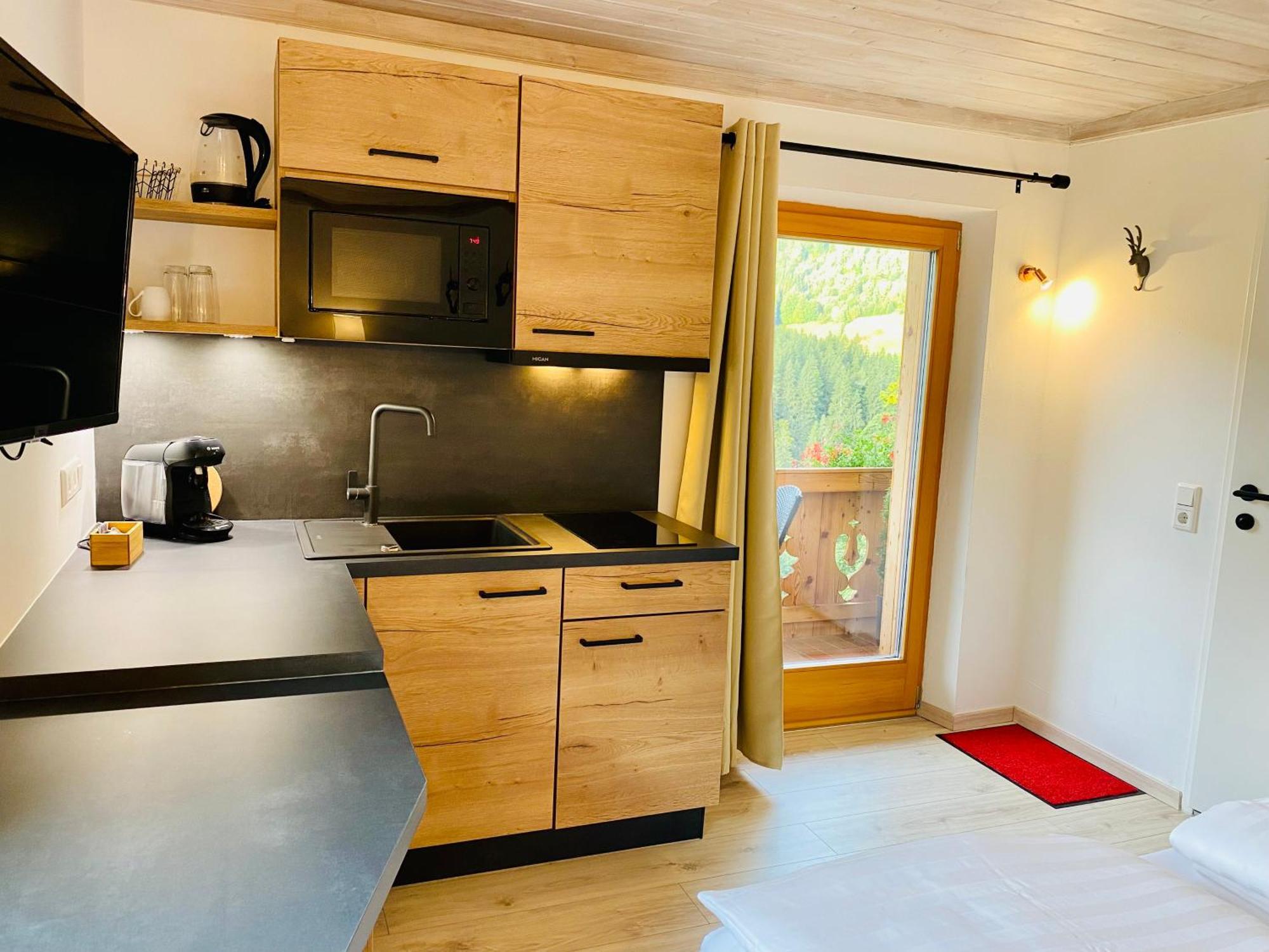 Alm Seasons Premium Chalet & Studios سالباخ هينترغليم الغرفة الصورة