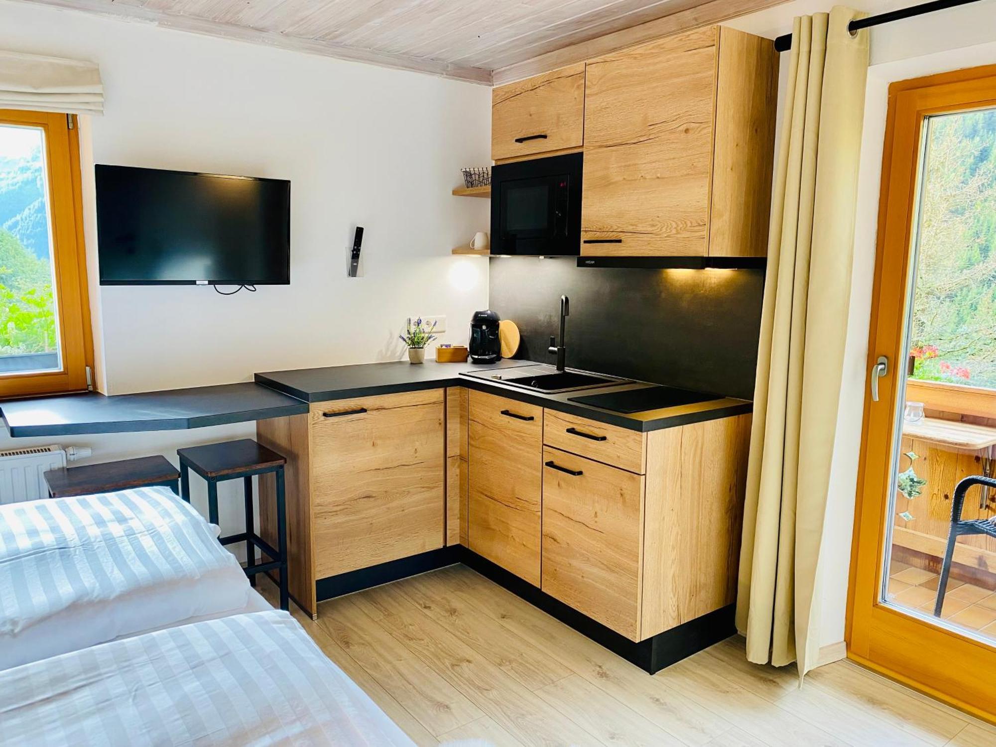 Alm Seasons Premium Chalet & Studios سالباخ هينترغليم الغرفة الصورة